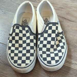 Vans Black and White Checkerboard Slip-On Sneakers